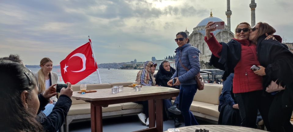 Istanbul: Bosphorus Sunset Cruise on Yacht with Live Guide - Bridge views and neighborhood coastline: where the Bosphorus becomes a photo walk